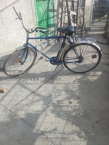 Городской велосипед с классической стальной рамой. Урал Особенности: -