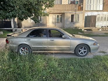 авто подборщик: Mazda 626: 1998 г., 2 л, Механика, Бензин, Седан — 7