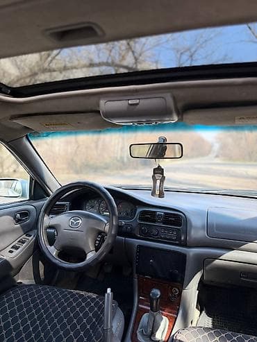 audi q4: Mazda 626: 2000 г., 2.5 л, Ручные, Бензин, Седан — 6