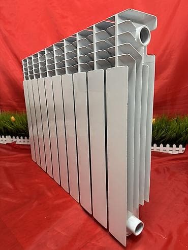Алюминиевый секционный радиатор отопления. - Материал: алюминий с