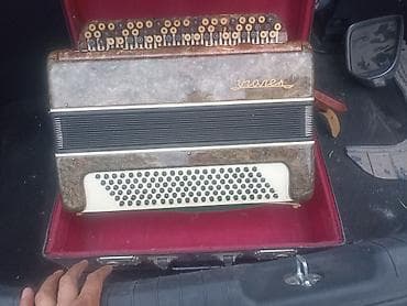 Баян «Юпитер» (кнопочный) - Кнопочная клавиатура справа, басы/аккорды