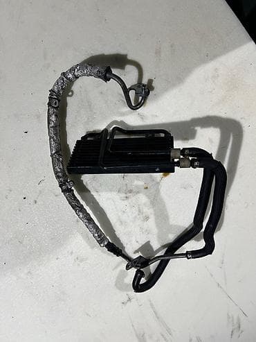 Глушители: Радиатор гидроусилителя руля Mercedes-Benz - Оригинальная деталь — 1