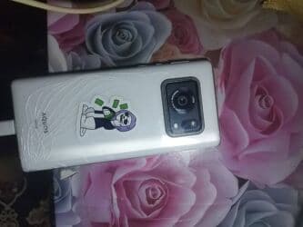 телефен: Смартфон Sharp Aquos (серия с камерой LEICA), цвет белый. Основные — 3