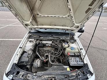 Легковой автомобиль с бензиновым двигателем и механической коробкой