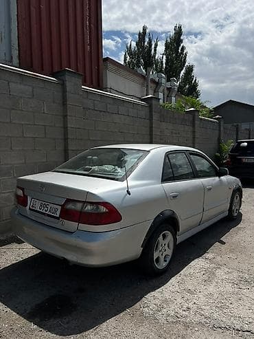 чехлы на морнинг: Mazda Capella: 2001 г., 2 л, Механика, Бензин, Седан — 6