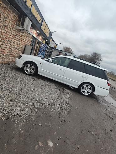 маховик форд фокус: Белый универсал с рейлингами на крыше. Компактный кузов, пять дверей — 2