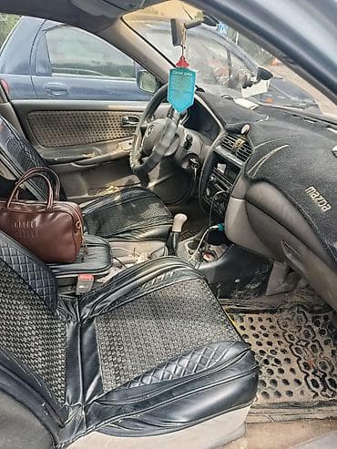капот мазда 626: Mazda 626: 2001 г., 1.8 л, Механика, Бензин, Седан — 5