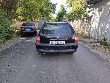 mc 2000: Opel Astra: 1998 г., Универсал — 2