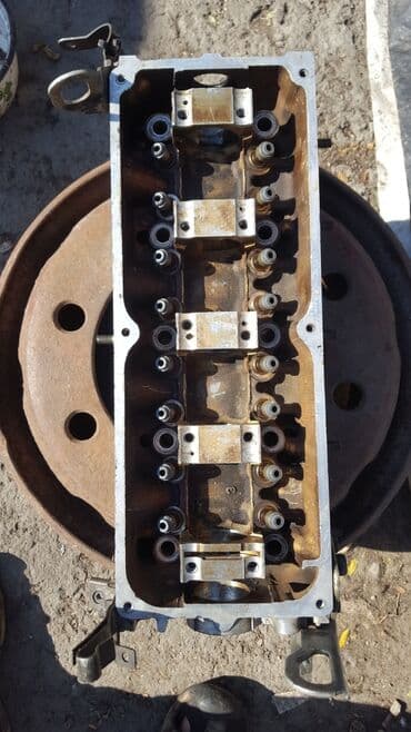 купить полировочную машинку: Mazda 121 головка двигателя блок в сборе — 1