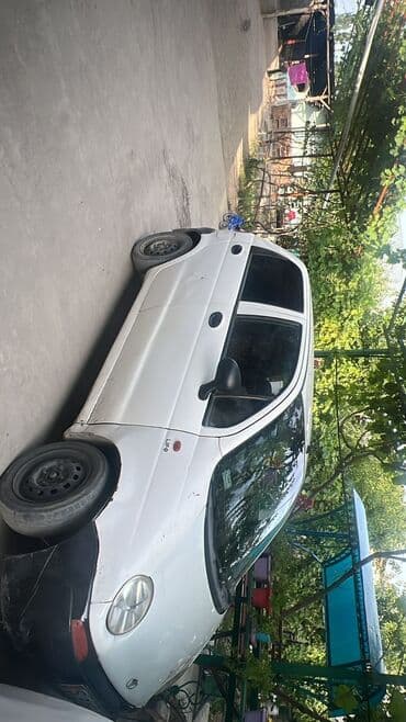 лампа прикроватная на тумбочку: Приборлор калканы Daewoo 2002 г., Колдонулган, Оригинал — 2