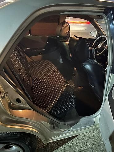 подшивочная машина: Mazda 323: 2002 г., 1.6 л, Ручные, Бензин, Седан — 4