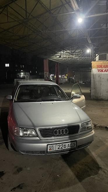 Audi A6: 1994 г., 2.6 л, Механика, Газ, Седан