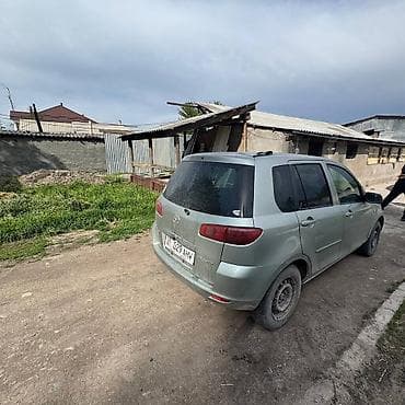 honda e: Mazda Demio: 2003 г., 1.5 л, Автомат, Газ, Хэтчбэк — 4