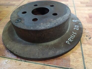 перфорированные тормозные диски: Toyota Prius 20 тормозной диск, Тойота Приус 20 диск тормозной Задний — 1