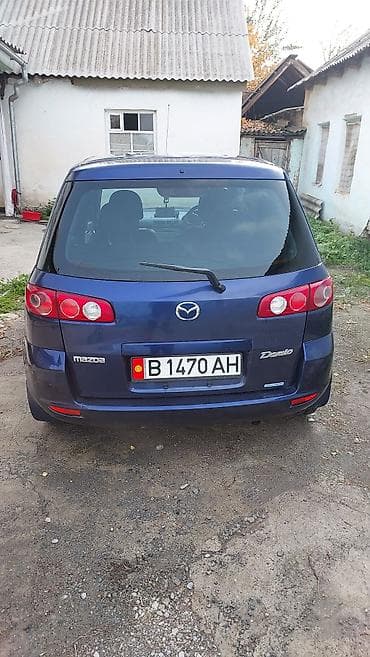 чехлы бу: Mazda Demio: 2004 г., Автомат, Бензин, Хэтчбэк — 4