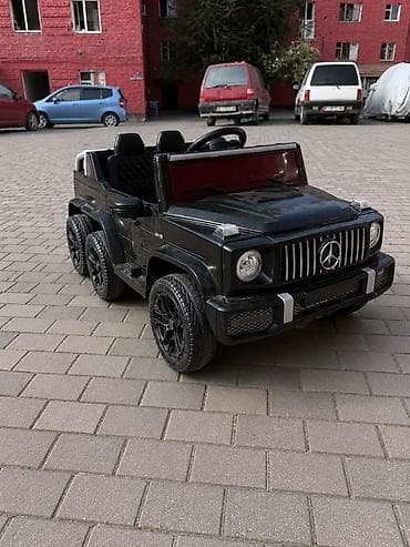 машинка детей: Детский электромобиль-джип 6×6 (стиль G‑class), черный. - Кузов — 1