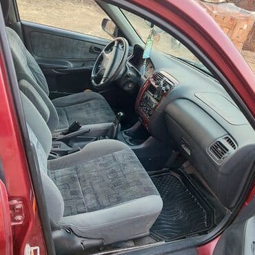 Mazda 626: 1996 г., 1.8 л, Механика, Бензиновая, Седан — 6