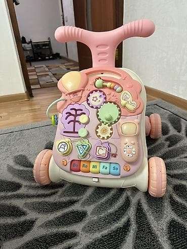 Развивающий толокар-ходунки для малышей - Многофункциональная панель