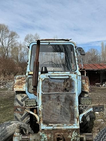 Тракторы ХТЗ: Трактор колесный с кабиной, класс тяги примерно 1,4–2,0 (типовая — 1