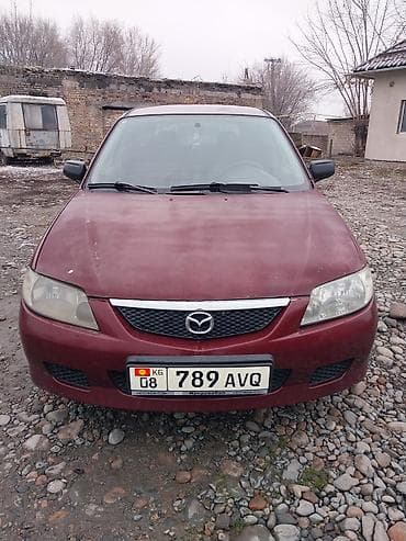 Mazda 323: 2002 г., 1.5 л, Механика, Бензин, Универсал