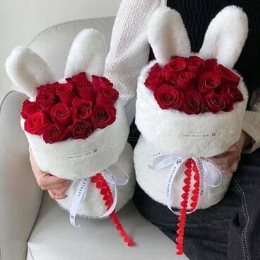 шоколадный букет: Букет из красных роз, оформленный в виде мягкой игрушки-зайчика с — 2