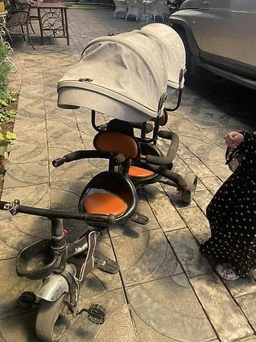 Унаа: Детский трёхколёсный велосипед для двойни (тандем) - Две посадочные — 1