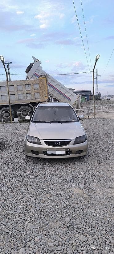 Mazda 323: 2003 г., 1.6 л, Автомат, Бензин, Хэтчбэк
