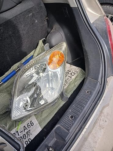 Компрессоры для авто: Передняя левая фара Nissan — 1