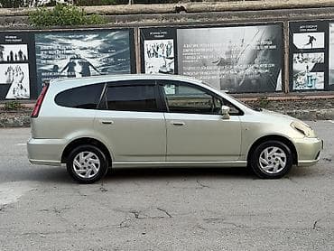 женщину: Honda Stream: 2005 г., 1.7 л, Автомат, Бензин, Минивэн — 6