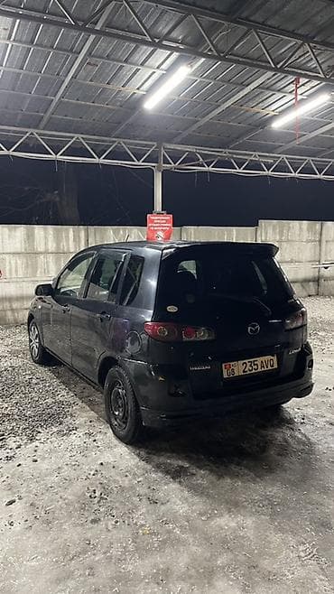mini cuper: Mazda Demio: 2005 г., 1.3 л, Автомат, Бензин, Хэтчбэк — 4