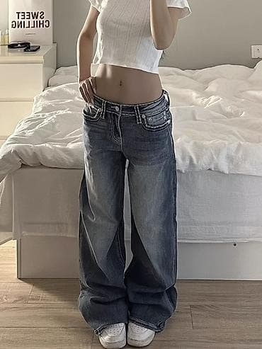 Широкие джинсы с низкой посадкой я и декоративными карманами -