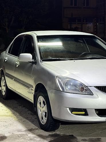 01: Mitsubishi Lancer: 2004 г., 1.6 л, Автомат, Бензин, Седан — 1
