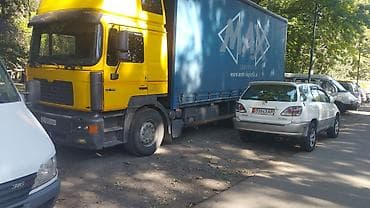 мерседес т 1: Тентованный грузовик MAN с боковой и верхней загрузкой - — 3