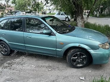 15 демио: Mazda 323: 2002 г., 1.6 л, Механика, Бензин, Хэтчбэк — 3
