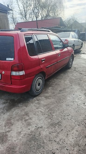 койго алмашам: Mazda Demio: 1998 г., 1.3 л, Кол менен иштөөчү, Бензин, Van — 4