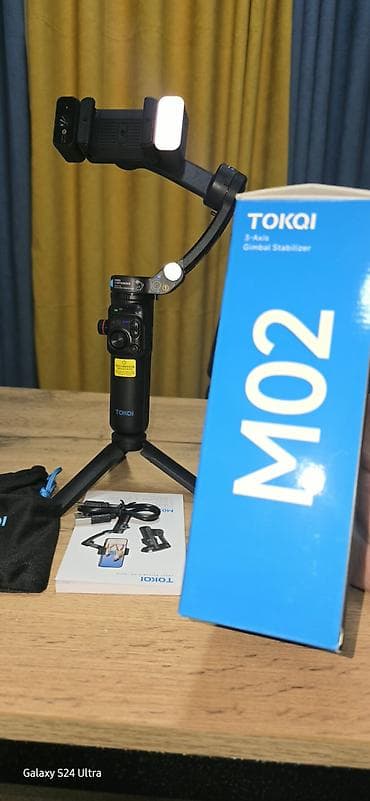 чехоы: Стабилизатор для смартфона TOKQI M02 (3-осевой) Описание: - 3-осевая — 6