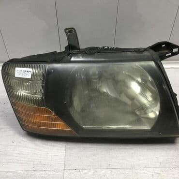 Mitsubishi Pajero W74 Фара передняя, Митсубиси пажеро фара передняя
