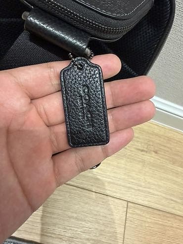 Сумки: Сумка-слинг COACH из натуральной зернистой кожи, цвет черный. Покупал — 3