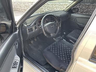 дайво: Daewoo Nexia: 2012 г., 1.5 л, Механика, Бензин, Седан — 9