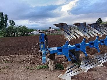 Унаа: Навесной оборотный плуг, 4-корпусный Описание: - Полевой оборотный — 3