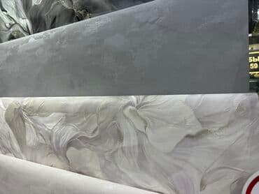 обои на мебель: Рулоны обоев с различными текстурами и рисунками. Верхний рулон — 1