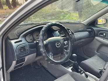фередо 124: Mazda Familia: 2003 г., 1.6 л, Ручные, Бензин, Седан — 7