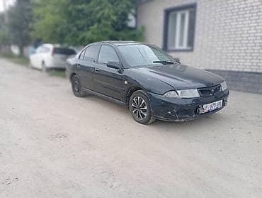 Продажа авто: Mitsubishi Carisma: 1999 г., 1.6 л, Механика, Бензин, Седан — 2