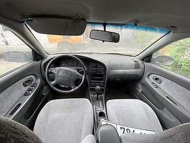 bid e5: Kia Sephia: 1999 г., 1.8 л, Автомат, Бензин, Седан — 7