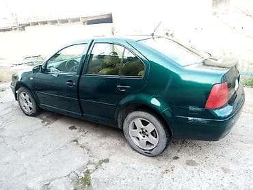 Транспорт: Volkswagen Bora: 1994 г., Механика, Бензин, Седан — 7