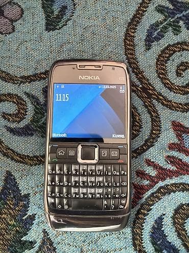 сколько стоит кнопочный телефон samsung: Nokia E71, цвет - Серебристый — 1