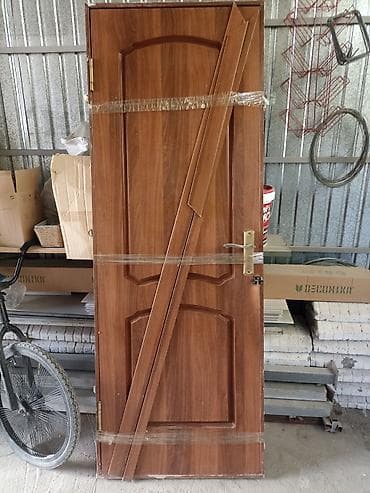 Межкомнатные двери из МДФ/ДСП с отделкой под тёмное дерево (орех)