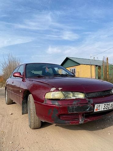 арзан матиз 1: Mazda 2: 2001 г., Кол менен иштөөчү, Бензин — 8