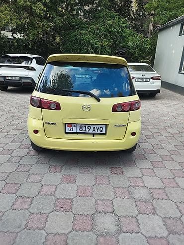 лабо автамат: Mazda Demio: 2004 г., 1.3 л, Автомат, Газ, Хэтчбэк — 4