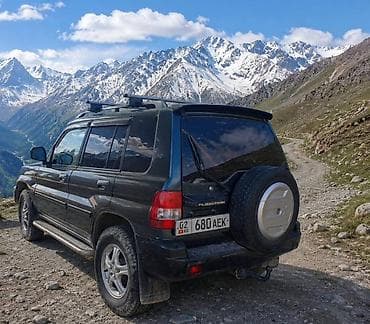 sprinter 315: Mitsubishi Pajero iO: 2004 г., 2 л, Автомат, Бензин, Внедорожник — 1